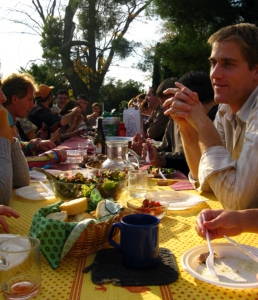Filling the table with French neighbors at a celebration in Arles, France. Photograph by Amanda McMillan Lequieu. Click to enlarge.