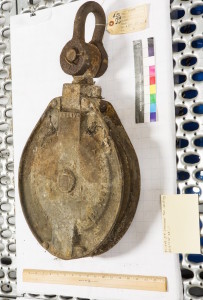 Iron pulley, 1800s, John Halpern, ES 1978.217.01.1, Empire Stores archaeology collection, New York State Office of Parks, Recreation, and Historic Preservation.