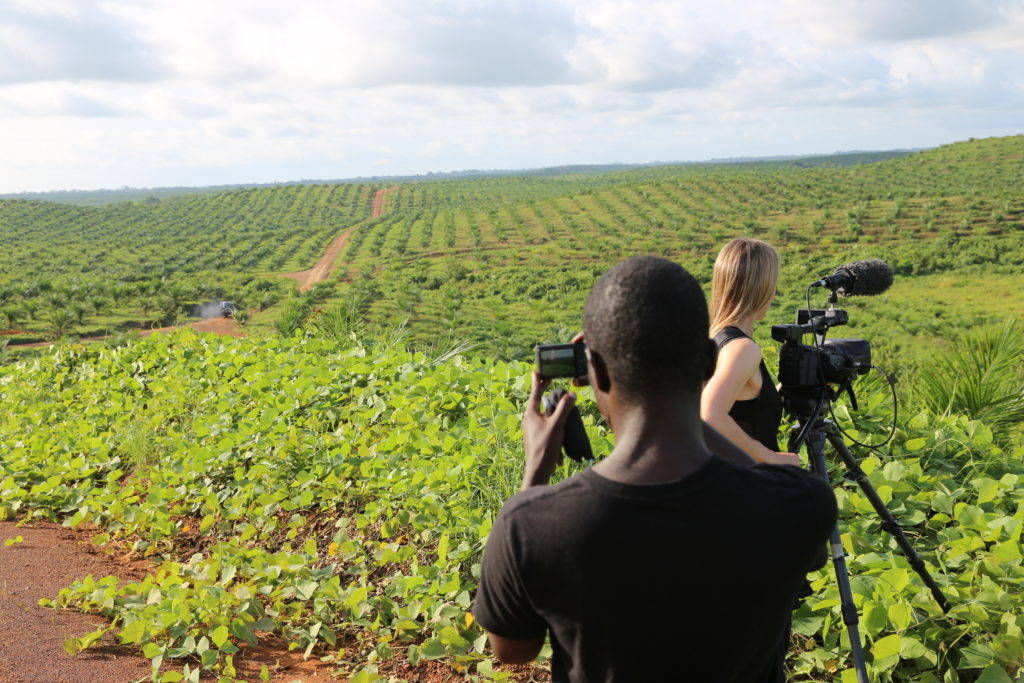 Filming on the Sime Darby concession, a monoculture landscape of newly planted oil palm in Grand Cape Mount county, Liberia. With Emmanuel Urey and Sarita Siegel. Gregg Mitman, June 12, 2014