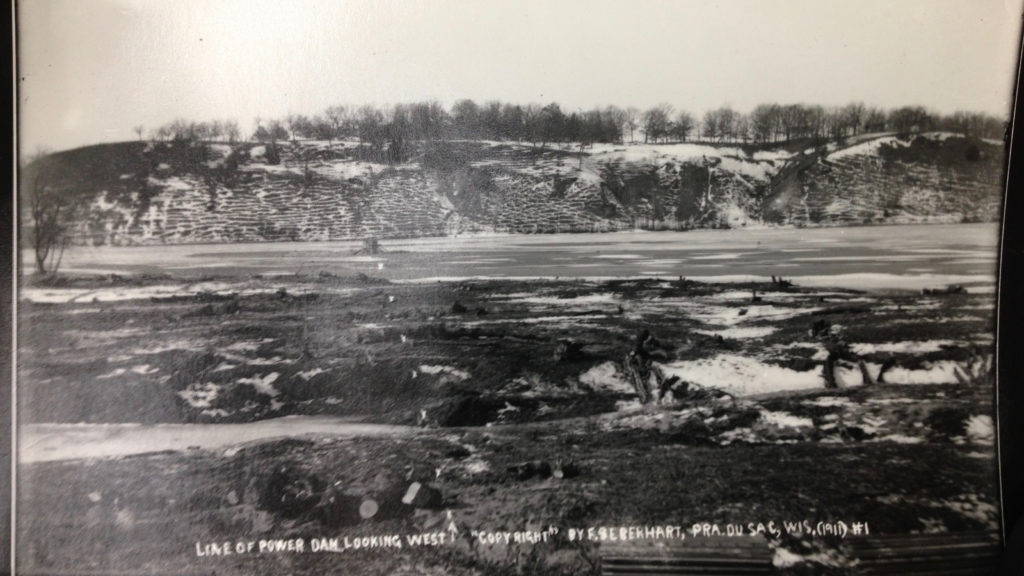 Looking West along future dam site, 19111. Photo: Frank Eberhart, Courtesy of the Wisconsin Historical Society.