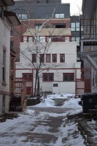 Fig. 3. Exterior of Robert Lamp House (1903), in Madison. Located at the center of a downtown urban block, the once fairly quiet setting is eroding due to encroaching modern developments on several sides. Photo by Chris Slaby, February, 2016.