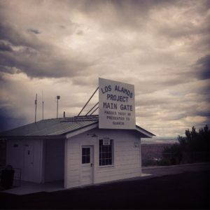 Visitors can walk around and explore the historic Main Gate to Los Alamos, now located in a park by the main highway. The interior of the guard station has now become public restrooms. Photo by author.