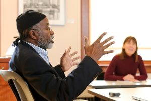 John Francis, visiting associate professor of environmental studies at the University of Wisconsin-Madison, speaks to students in his graduate course in December 2011. <a href="http://photos.uc.wisc.edu/photos/14969/view" target="_blank">Photo by Bryce Richter</a>.