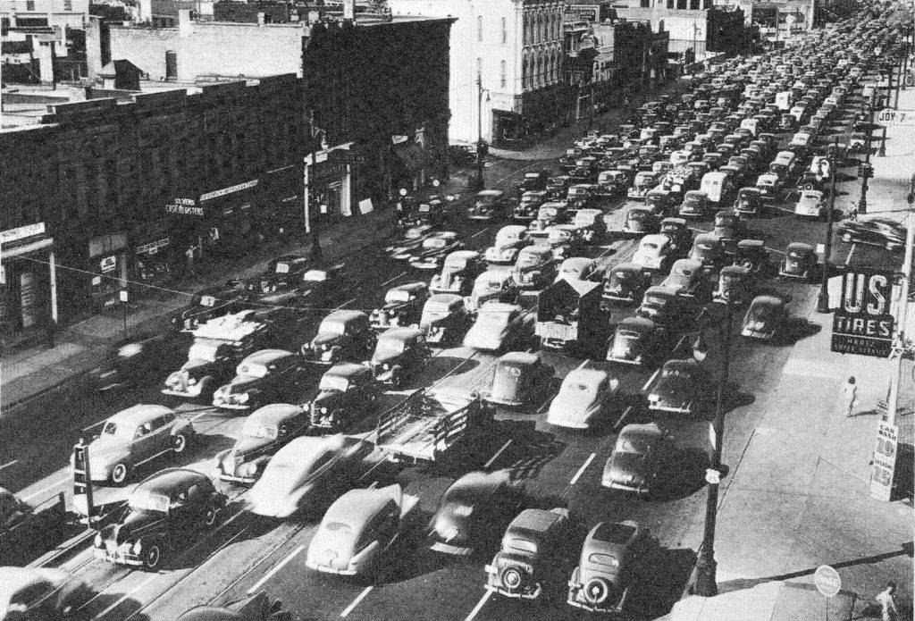 Traffic jams became increasingly common as more Americans purchased cars and commuted from suburbs to city.