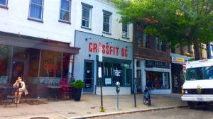 A view of 14th Street, a main corridor in the Shaw/U Street neighborhood. A wine bar and pawn shop share the same block. Photo by the author, May 2017.