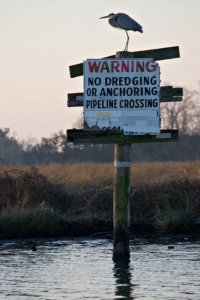 Land erosion has resulted in pipelines passing directly through marshlands and bayous. Loe.org, 2017.