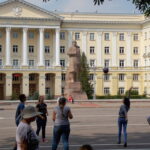 High schooler students play volleyball in the square under Lenin's watchful eye. (Conti, 2014) High schooler students play volleyball in the square under Lenin's watchful eye. (Conti, 2014)