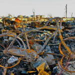 A bike in the wreckage of Breezy Point. The guardhouse bars intruders. But neither gates nor privilege stopped the fire that ignited house after house, until Ocean Avenue was an ocean of fire. (December 2012) A bike in the wreckage of Breezy Point. The guardhouse bars intruders. But neither gates nor privilege stopped the fire that ignited house after house, until Ocean Avenue was an ocean of fire. (December 2012)