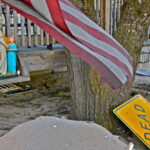 Flags hang everywhere, signs of resilience and community strength. (December 2012) Flags hang everywhere, signs of resilience and community strength. (December 2012)