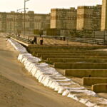 The $140 million Rockaway Boardwalk Reconstruction Project is years behind schedule. Even before Sandy, many residents in the derelict high-rises did not have adequate heating or electricity. Two years later, many still don’t. (November 2014) The $140 million Rockaway Boardwalk Reconstruction Project is years behind schedule. Even before Sandy, many residents in the derelict high-rises did not have adequate heating or electricity. Two years later, many still don’t. (November 2014)