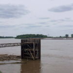 Looking across the river from St. Louis to the Illinois shoreline at the <a href="https://en.wikipedia.org/wiki/Mary_Meachum" target="_blank">Mary Meachum Freedom Crossing</a>. As the group learned, the river was both boundary and horizon for slaves seeking to escape to the free state of Illinois. Photo by Nathan Jandl.