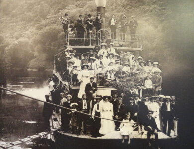 Riverboat history is part of the national and nostalgic imagination of the city of Whanganui, its river, and New Zealand’s North Island more generally. A black and white photograph of a crowded riverboat